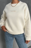Sweater mit Good Vibes Aufdruck