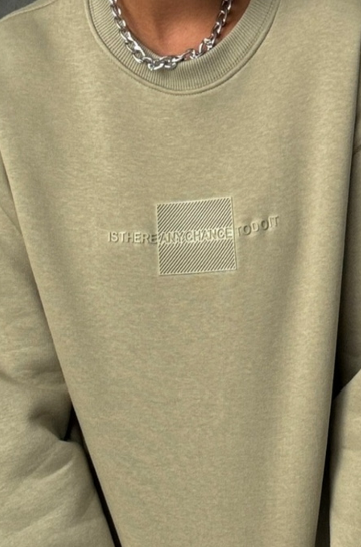 Sweater mit Chance Applikation